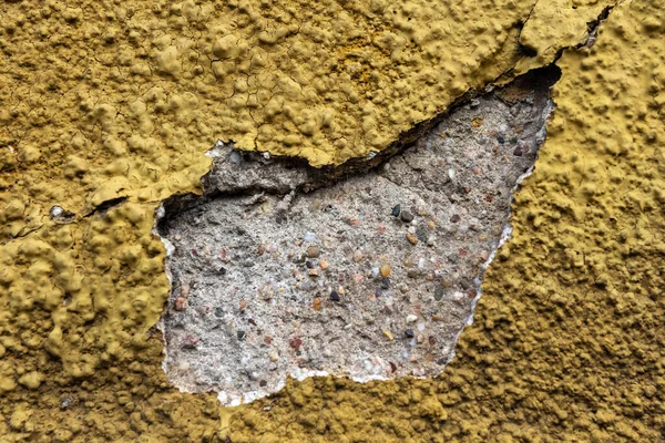 Background Texture Old Cracked Rough Cast Yellow Plaster Wall Exposed — Stock fotografie