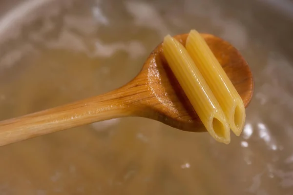 Two Noodles Wooden Spoon Pot Water Selective Focus — Stock Photo, Image