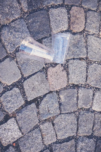 Two Empty Plastic Cups Paving Stones City — Foto de Stock