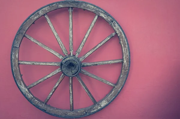 Old Wooden Wheel Red Wall Decoration Text Free Space Right — ストック写真