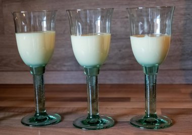 glasses filled with fresh vanilla pudding