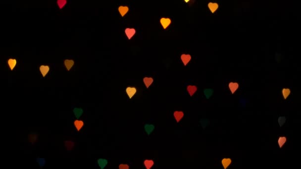 Clignotant Bokeh Lumières Coeurs Sur Guirlande Décorative Sur Fond Noir — Video