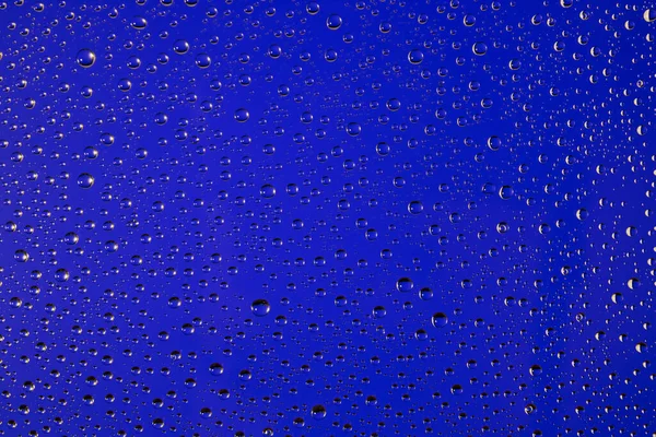 Vízcseppek Textúrája Üvegre Kék Alapon Absztrakt — Stock Fotó