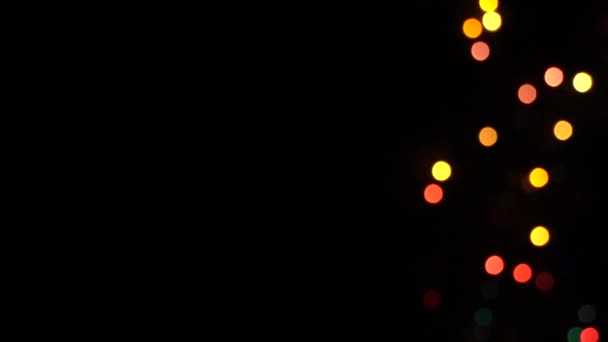 Λάμψη Bokeh Φώτα Κύκλους Διακοσμητικό Γιρλάντα Μαύρο Φόντο Εορταστική Αναβοσβήνει — Αρχείο Βίντεο