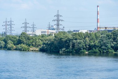 Electricity transmission towers and power lines. High voltage pole. Energy concept in the city of industry. Crisis and problems in the energy sector.