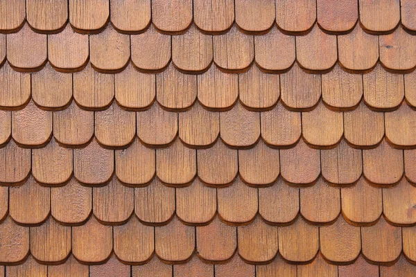 Wooden shingles on house wall close up — Stock Photo, Image