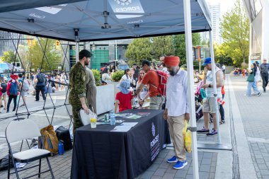 Vancouver, Canada - July 1,2022: A view of pop up Canadian Armed Forces station for recruiting new members on Canada Day in downtown Vancouver