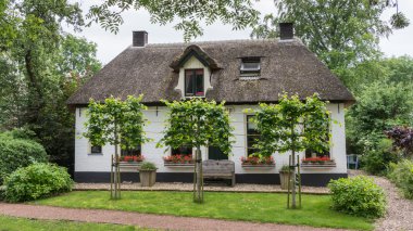 Cozy little cottage in Giethoorn Netherland clipart