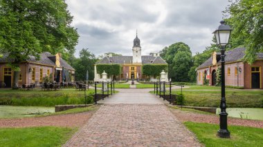 Dutch castle the Fraeylemaborg in Slochteren in Holland clipart