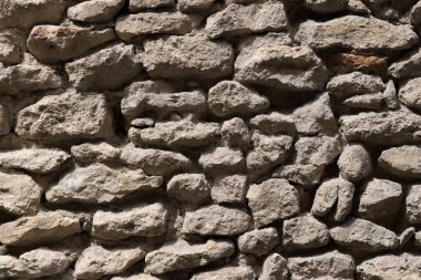 Küçük gri kayalardan oluşan bir arka plan