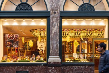 Brussels, Belgium - March 25, 2022: Shop window in galeries St. Hubert with chocolate and candy treats downtown Brussels in Belgium