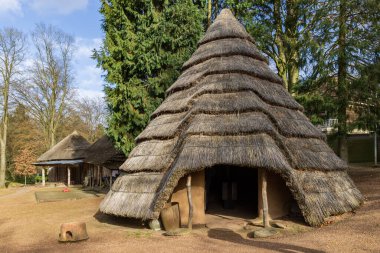Berg en Dal, The Netherlands - January 30, 2022: Open air display areas with African straw roofing houses in Africa Museum in Berg en Dal in Gelderland The Netherlands