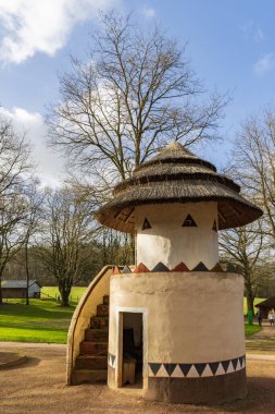 Berg en Dal, The Netherlands - January 30, 2022: Open air display areas with African tower house in Africa Museum in Berg en Dal in Gelderland The Netherlands