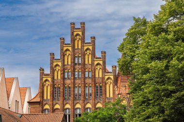 Cityscape with ancient stepped gable building in Lubeck in Schleswig-Holstein in northern Germany