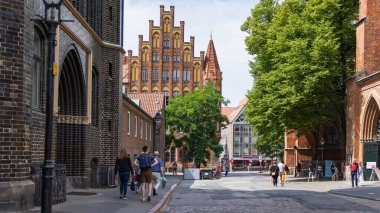 Lubeck, Germany - July 30, 2022: Market beside City hall of Lubeck in Schleswig-Holstein in northern Germany