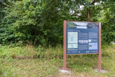 Zarrentin am Schaalsee, Germany- August 1, 2022: Information sign along the Border road former internal border West and East Germany in biosphere nature park Schaalsee
