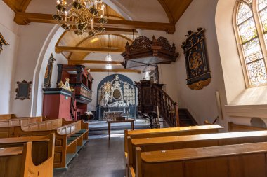 Midwolde, The Netherlands - August 24, 2022: Interior of roman church 12th century in Midwolde municipality Westerkwartier in Groningen province in the Netherlands