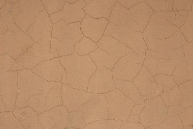 Eski çentikli beyaz gri açık bej boyalı sıva duvarlı arka plan dokusu.