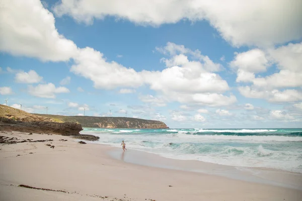 Boy Running Waves Beach Wind Turbines Cliff Background Portland Australia — Stock Photo, Image