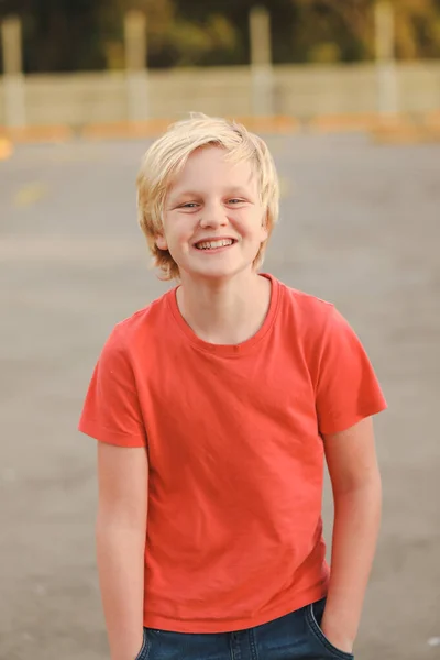 Portrait Caucasian Boy Blonde Hair Big Smile Wearing Pink Shirt Fotos de stock