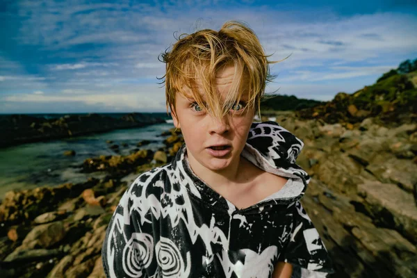 Boy Wearing Hooded Towel Swimming Being Silly Rocks Tanks Tourist —  Fotos de Stock
