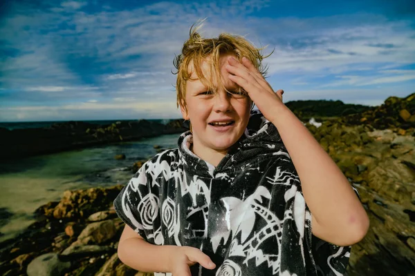 Boy Wearing Hooded Towel Swimming Being Silly Rocks Tanks Tourist —  Fotos de Stock