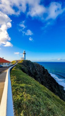Cape Byron Lighthouse on clear sunny day in Byron Bay Australia
