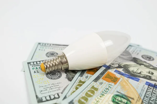 Light Bulb Dollars Energy Saving Concept Royalty Free Stock Images