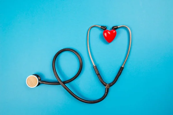 Medical Stethoscope Small Red Heart Isolated Blue Background — Stock Photo, Image