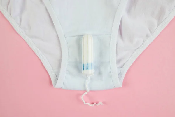 Close White Panties Tampon Pastel Pink Background — Zdjęcie stockowe