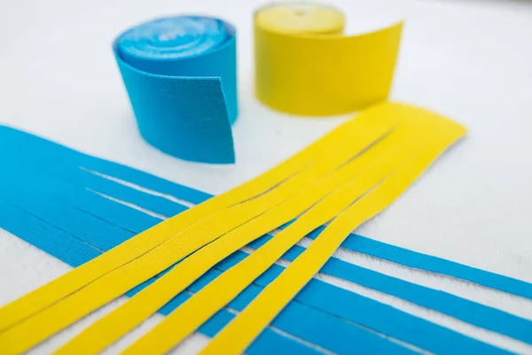 blue-yellow tapes for kinesio taping