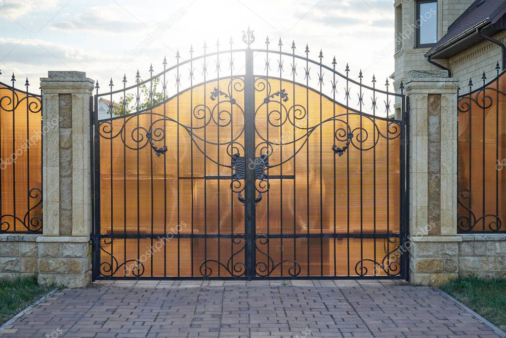 Wrought gates with polycarbonate sheet
