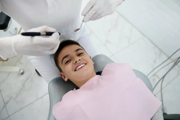 Adorable Brave Handsome Preadolescent Boy Dentist Chair Smiles Toothy Smile — Stock Photo, Image