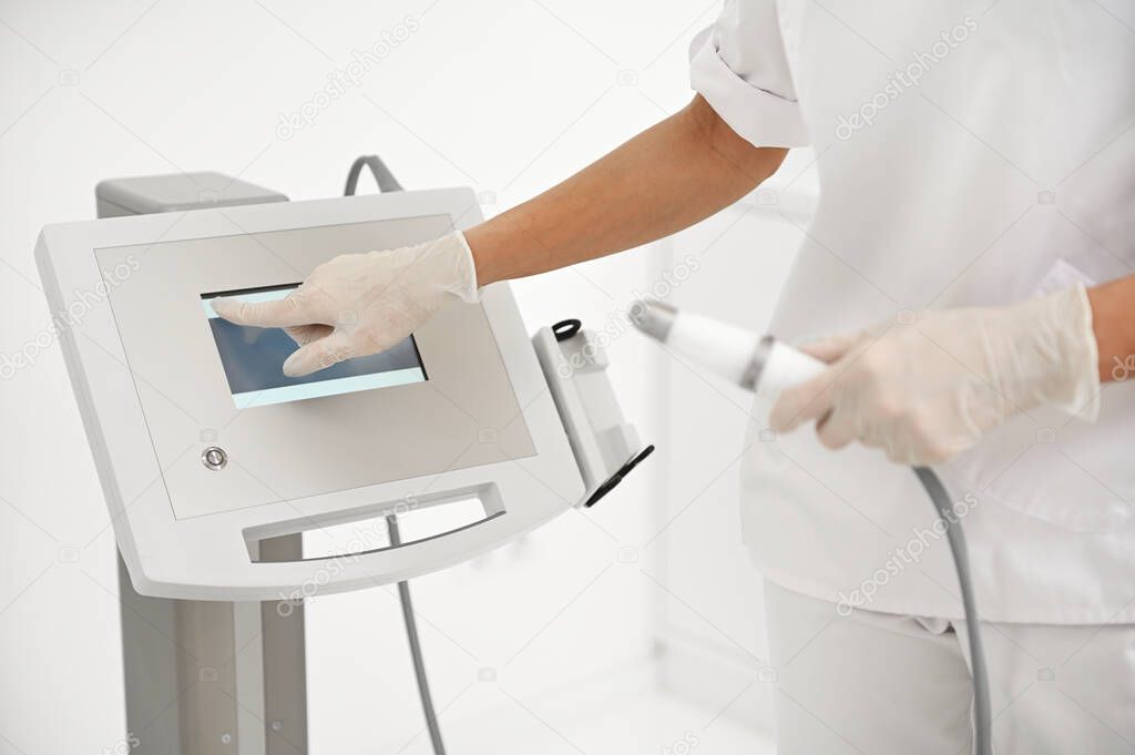 Close-up of modern a cosmetological apparatus, medical equipment for beauty treatment in modern wellness spa center. Anti-aging, revitalizing, rejuvenation, body and skin care concept. Copy ad space