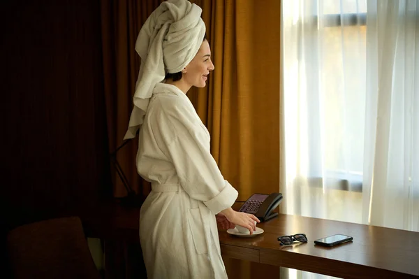 Smiling Confident Business Woman Bathrobe Head Wrapped Towel Standing Window — Stock Photo, Image