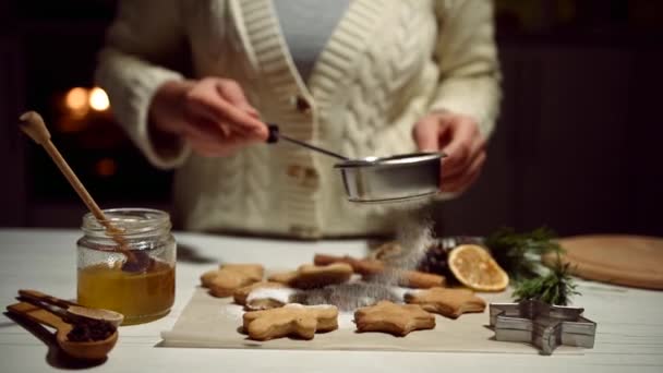 Video Chef Woman Sprinkling Icing Sugar Baked Gingerbread Cookies Shape — Stock Video