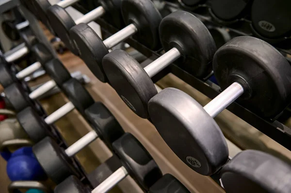 Overhead View Black Dumbbells Rack Sport Fitness Center Background Steel - Stock-foto