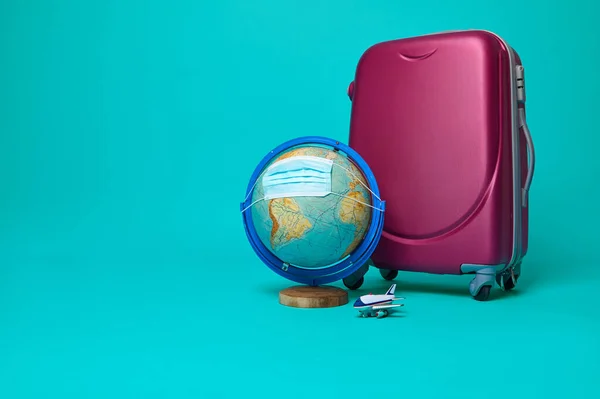 Studio Shot Suitcase Toy Airplane Globe Planet Earth Protective Medical — Stockfoto