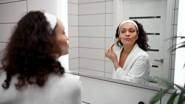 Charming Middle Aged Pretty Woman Bathrobe Puts Makeup Front Bathroom — Vídeo de Stock