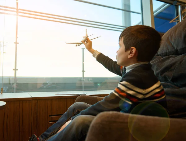 Portrait Adorable Child Boy Holding Toy Airplane Outstretched Hand Imitating — Stock fotografie