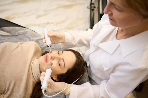 Overhead View Young Female Face Microcurrent Therapy Beautiful European Woman — стокове фото