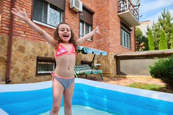 Cheerful Caucasian Baby Girl Bright Swimsuit Having Fun Inflatable Swimming — Zdjęcie stockowe