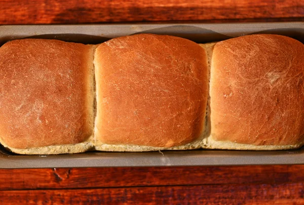 Cropped View Baking Dish Freshly Baked Hot Whole Grain Bread — Zdjęcie stockowe