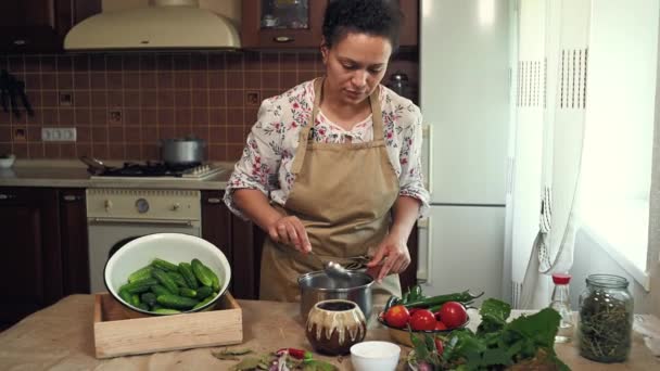 Multiethnic Pleasant Woman Housewife Wearing Chef Apron Pouring Salt Sugar — Stockvideo