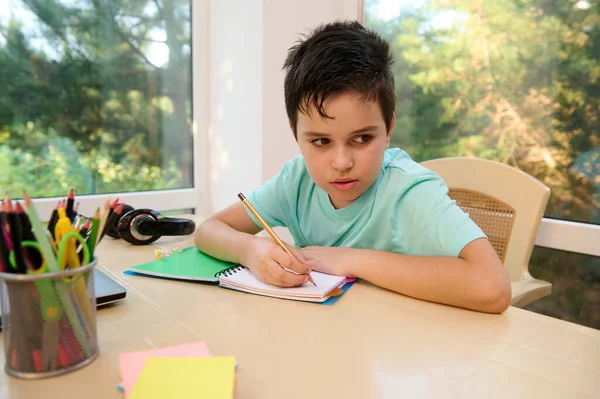 Smart Kid Handsome Caucasian Schoolboy His Desk Doing Homework Writing — ストック写真