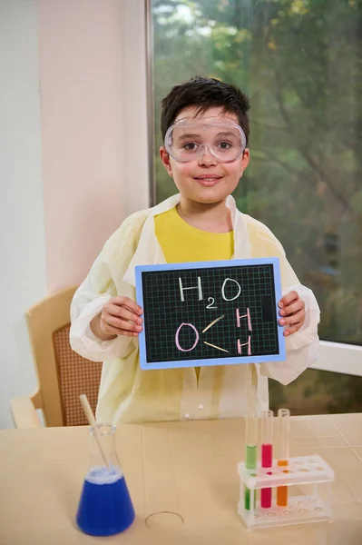 Schoolboy Scientist Chemist Safety Goggles White Lab Coat Holding Blackboard — Stock Fotó