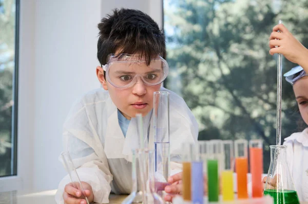 Curious Schoolboy Little Chemist Protective Goggles White Lab Coat Watching — Stockfoto