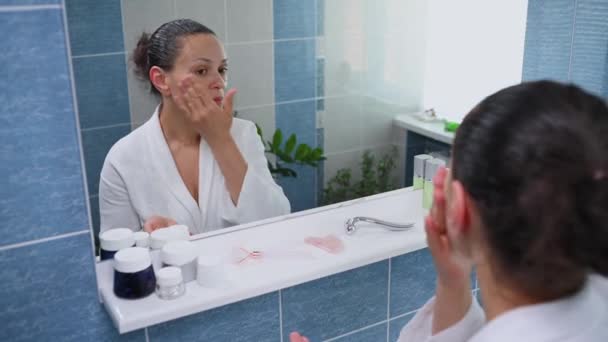 Attractive Woman White Bathrobe Looking Her Reflection Bathroom Mirror Applying — Video Stock