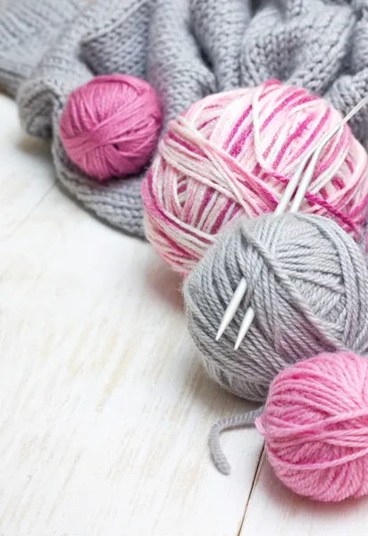 Balls of pink and gray yarn — Stock Photo, Image