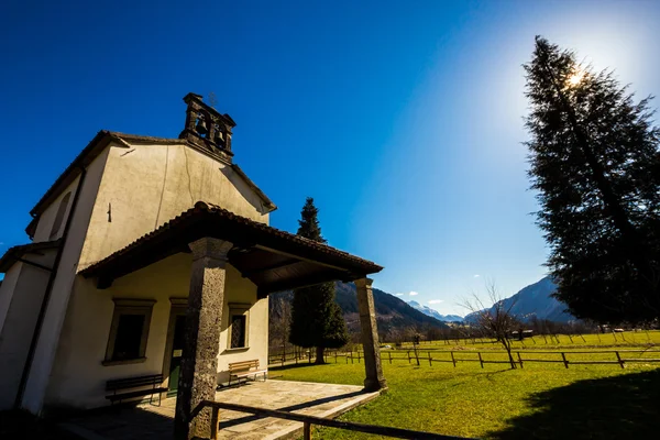 Church in the meadows of Alps — Stock Photo, Image